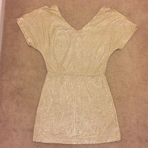 Gold mini dress with cold shoulders. Size M.